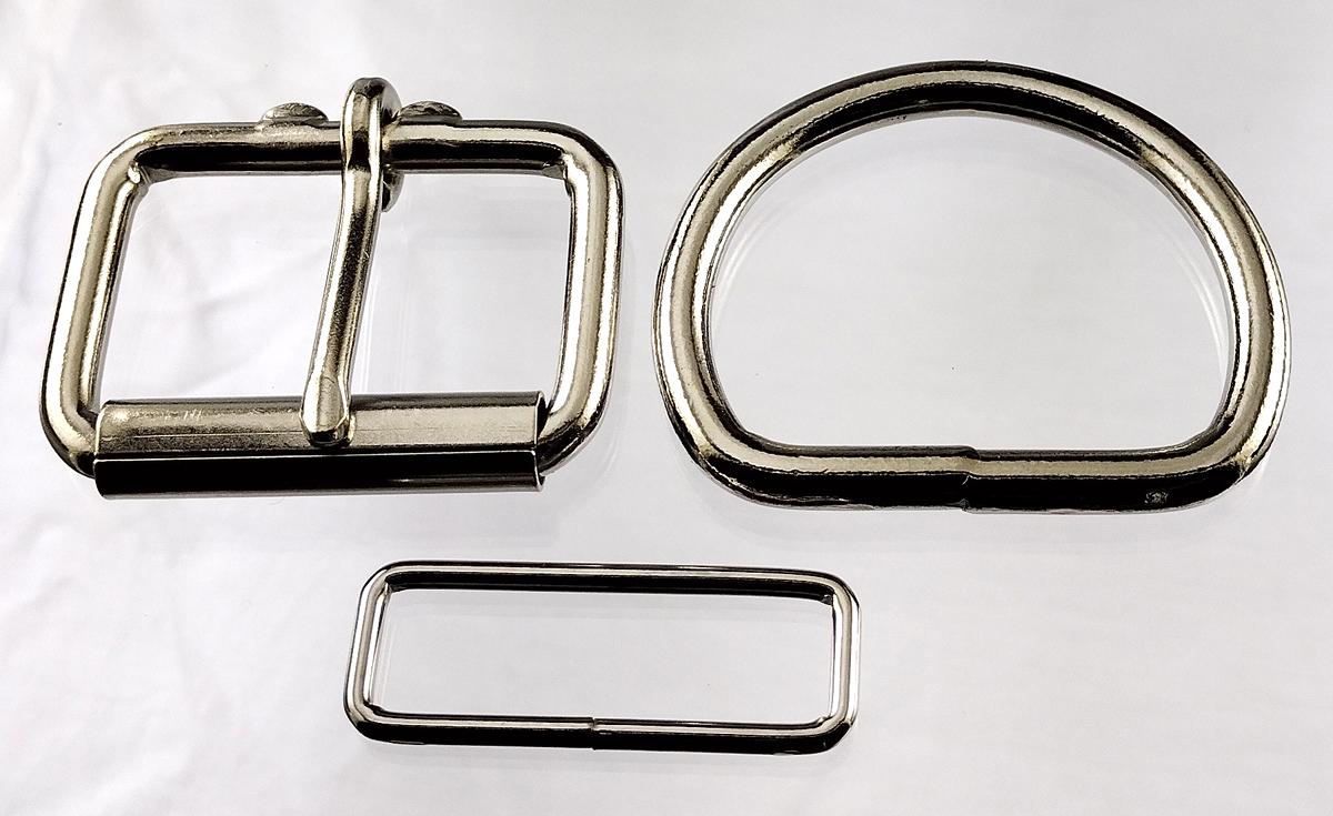 1 3/4 inch nickel plated maker pack consisting of 2 each of a heel bar roller buckle, D ring and a belt keeper.