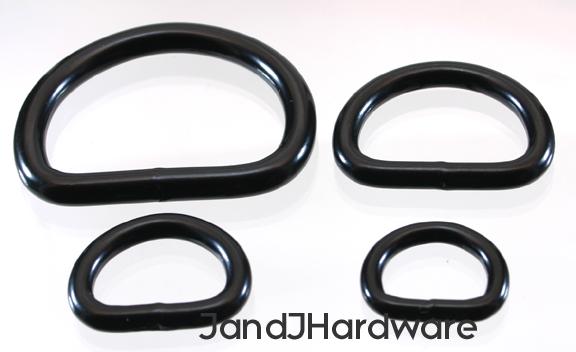 An image of a group of Heavy shiny black plated D rings for the leather and crafts trades from 5/8 to 1 1/2 inch in width.