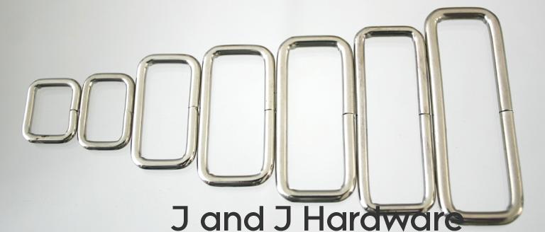 An image of a group of belt keepers or wire loops in nickle plate from 1/2 to 2 inch in width.